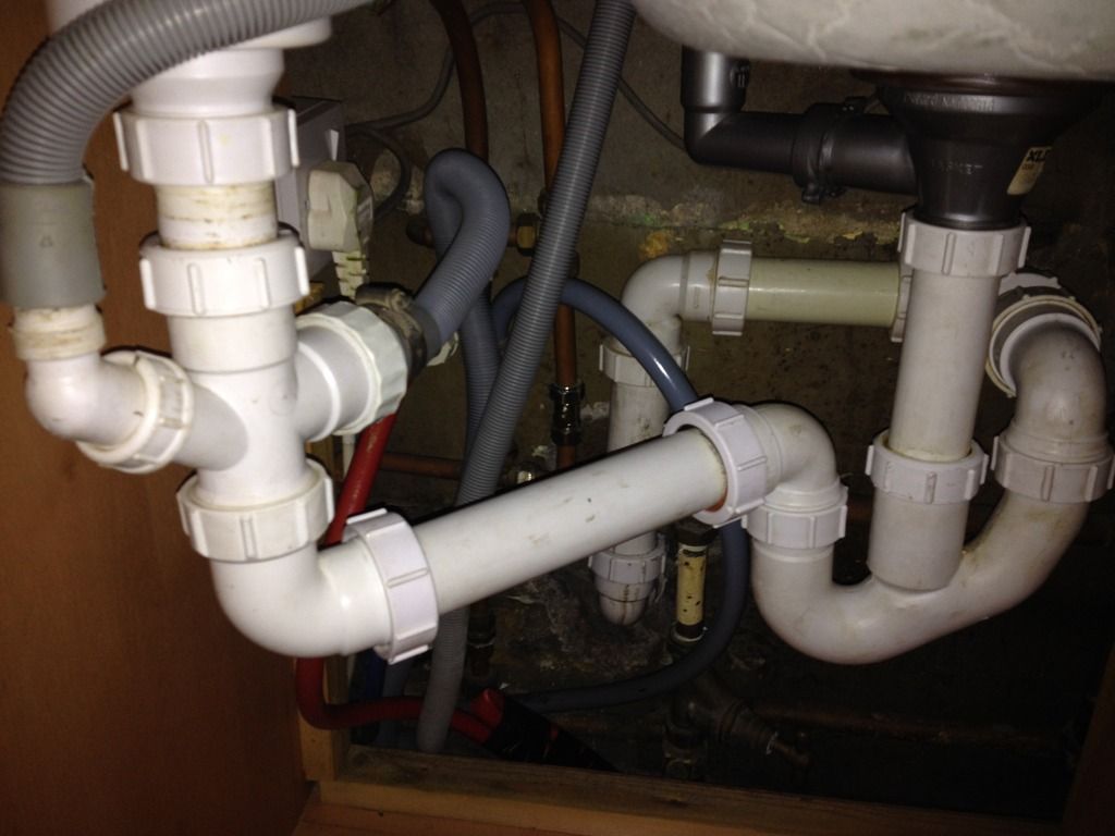 Sink slow draining/filling when washing machine empties Screwfix